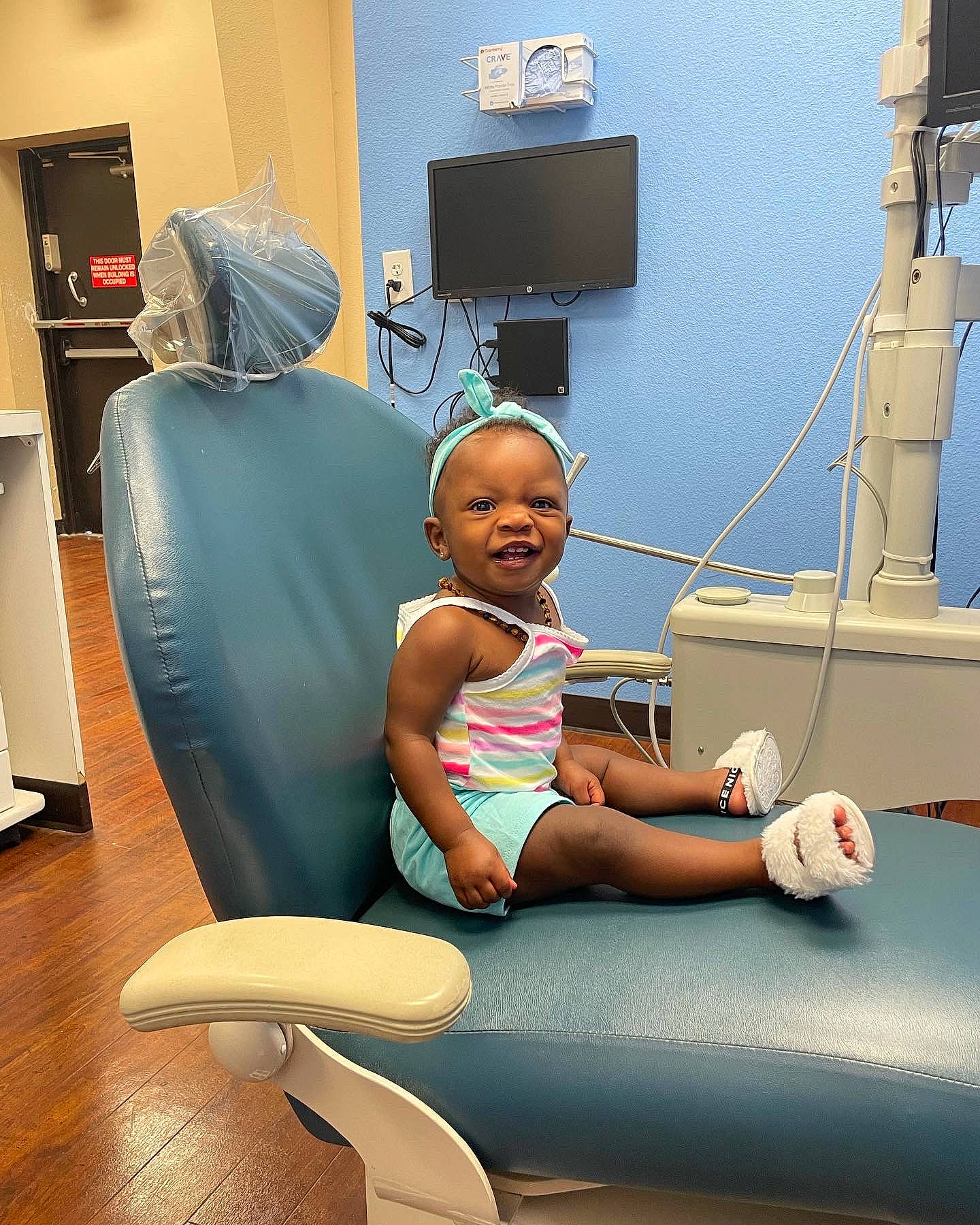 Khailani joined the competition — help win amazing prizes! baby, child, clinic, comfort, curtain, display_device, flooring, fun, human_leg, job, joint, leisure, medical, person, room, service, shoulder, sitting, t_shirt, television