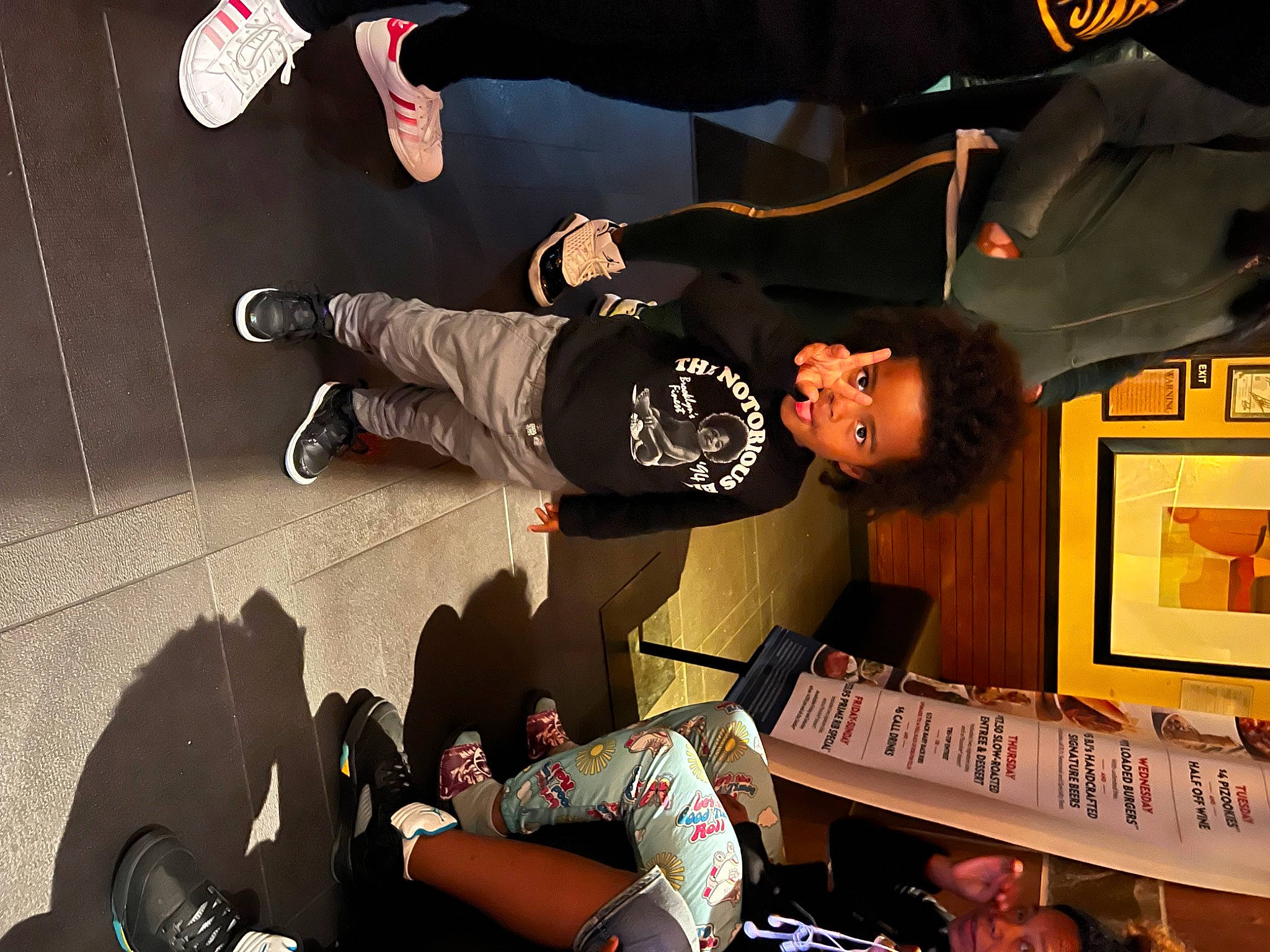 Prince is registered to the contest to win money with this photo: carmine, event, flash_photography, font, fun, games, person, recreation, room, snapshot, t_shirt, thigh