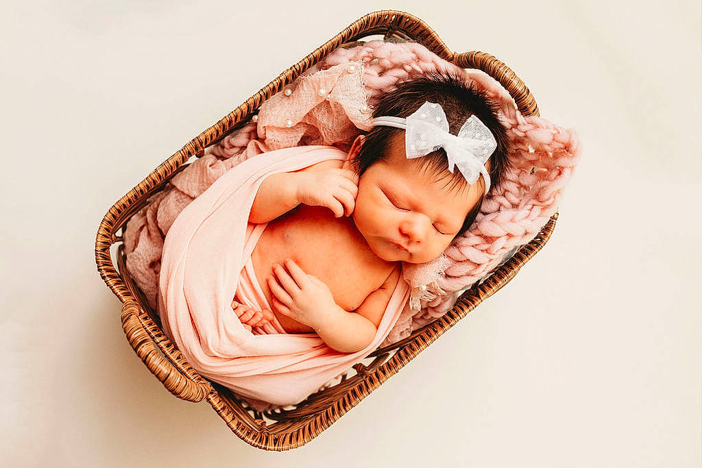 Swayze joined the competition — help win amazing prizes! baby, baby_products, baby_sleeping, baby_toddler_clothing, beanie, cap, child, comfort, fashion_accessory, finger, flesh, gesture, happy, headpiece, linens, pattern, peach, person, portrait_photography, sitting