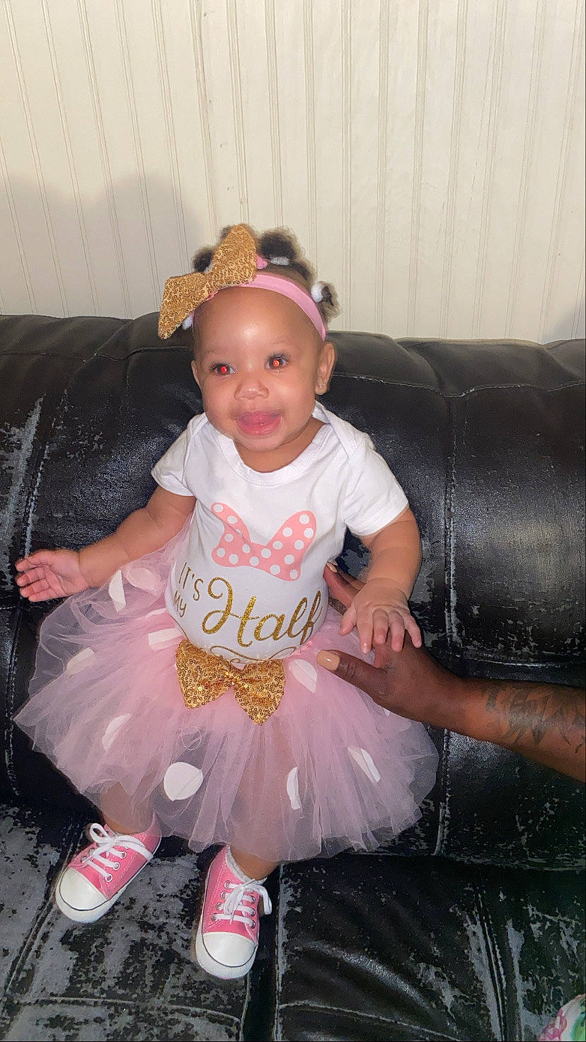 Princess joined the competition — help win amazing prizes! baby_toddler_clothing, child, costume, couch, event, fashion_accessory, fun, happy, head, headband, headgear, headpiece, jewellery, magenta, person, pink, purple, sandal, sitting, smile