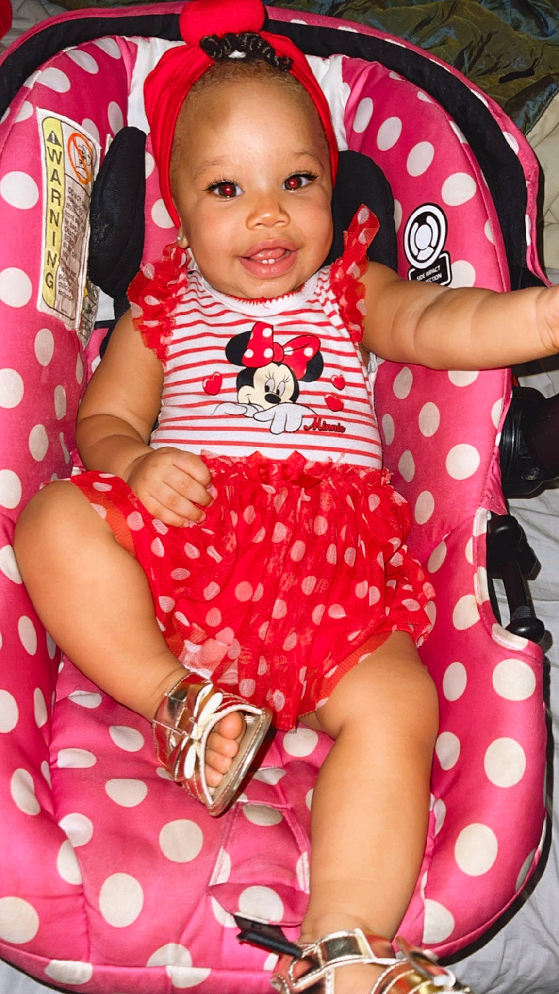 Princess is registered to the contest to win money with this photo: baby, baby_toddler_clothing, cheek, comfort, fashion, finger, happy, joy, leg, magenta, pattern, person, pink, product, red, skin, sleeve, smile, textile, thigh