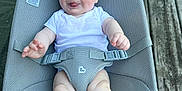Matthew joined the competition — help win amazing prizes! baby, child, infant, smiling, tongue_out, white_clothing, baby_seat, mesh_fabric, straps, wooden_deck, outdoor, cute, happy, skin, legs, feet, playful, seat, person, portrait