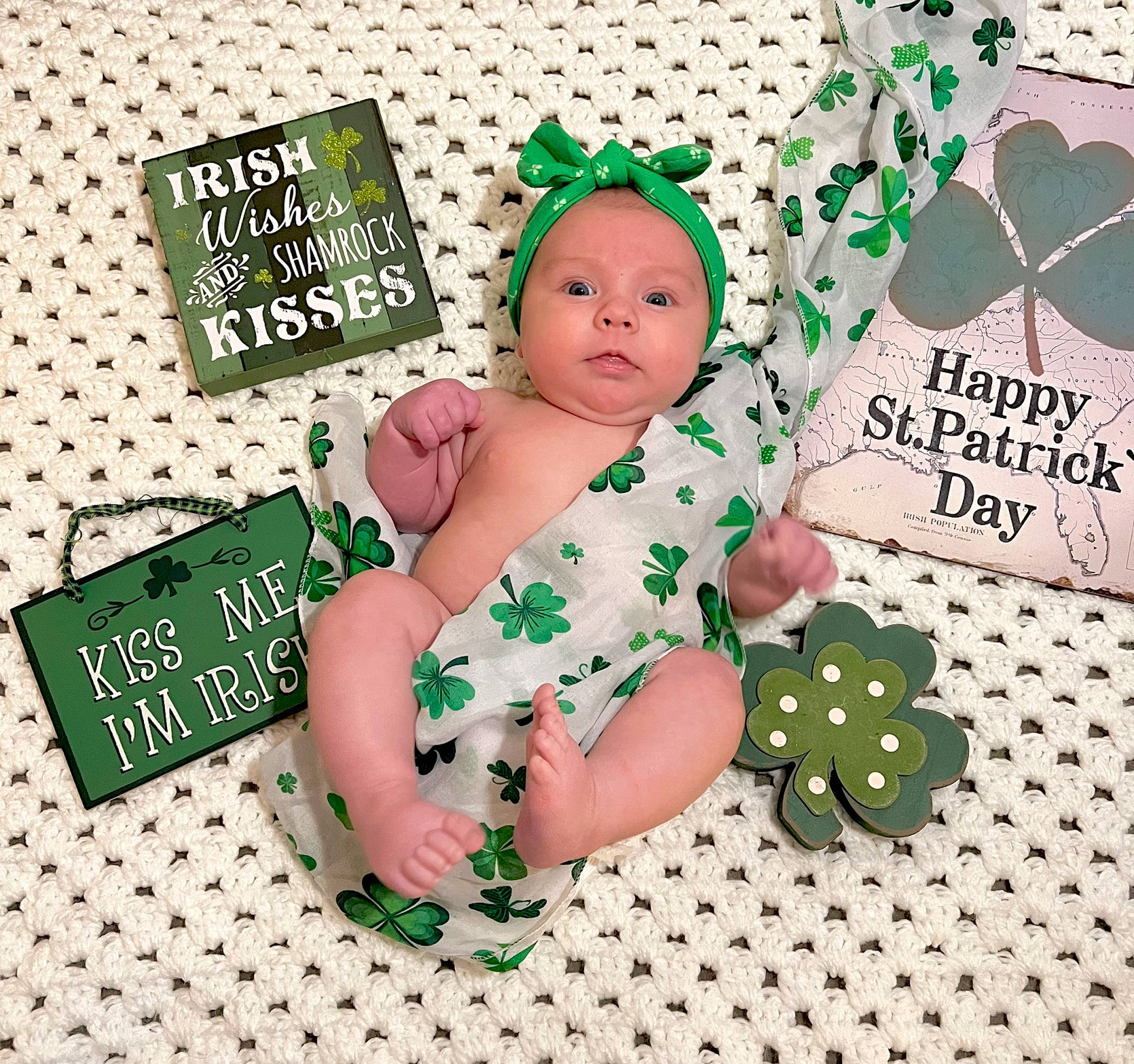 Saylor joined the competition — help win amazing prizes! baby, baby_toddler_clothing, cap, child, circle, eyelash, facial_expression, fashion_accessory, flesh, font, foot, green, happy, holiday, magenta, paper_product, pattern, person, rectangle, toddler