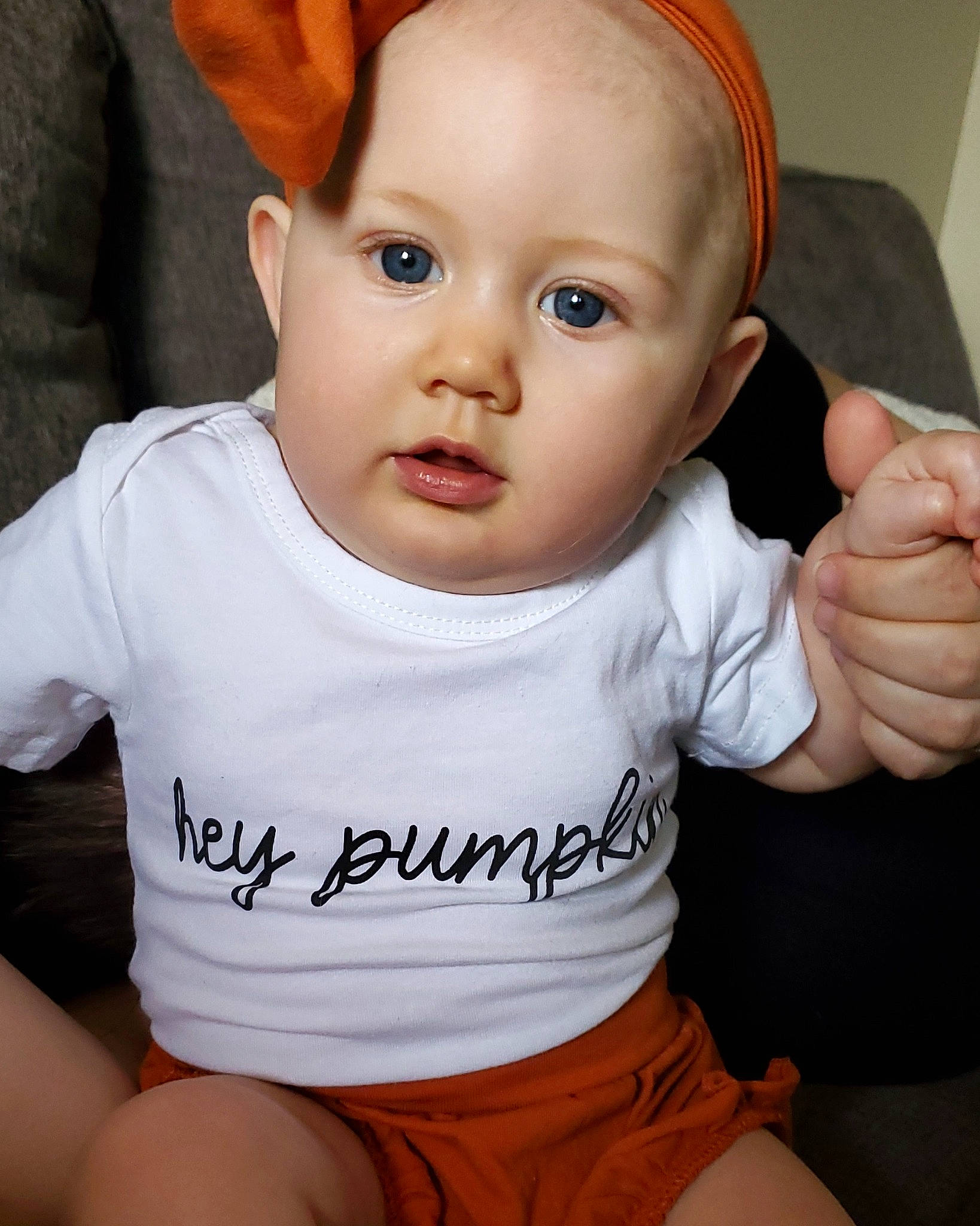 Madalynn is registered to the contest to win money with this photo: arm, baby_toddler_clothing, cheek, chin, ear, eye, eyebrow, eyelash, forehead, hair, hand, head, joint, lip, mouth, neck, nose, person, shoulder, skin