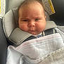 baby, blanket, car, car_seat, child, clothing, cushion, cute, expression, face, hair, headrest, indoors, infant, newborn, person, safety, seatbelt, small, transportation