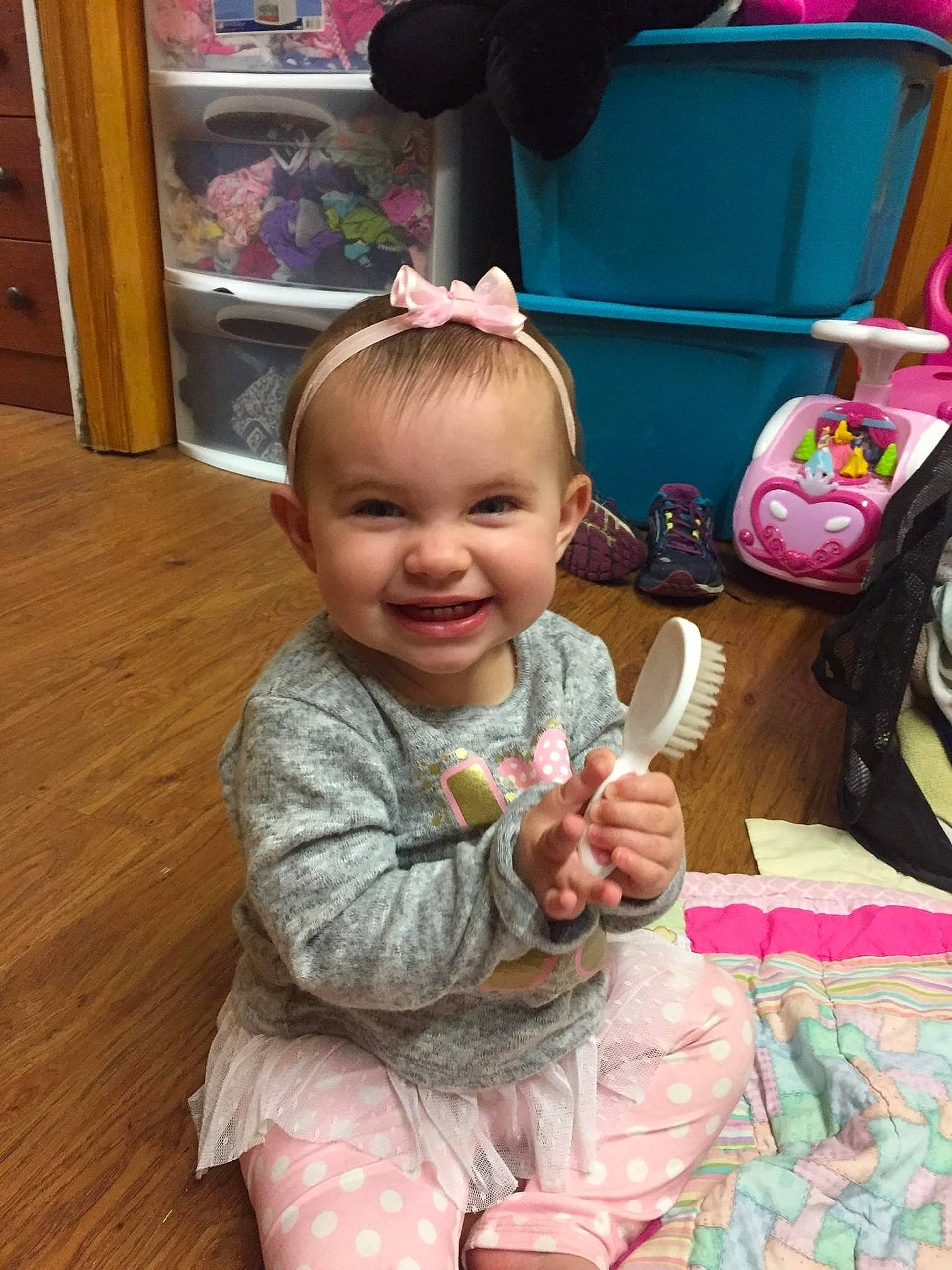 Evelyn Roach is registered to the contest to win money with this photo: child, day, girl, infant, joy, person, pink, play, product, sitting, skin, textile, toddler, toy