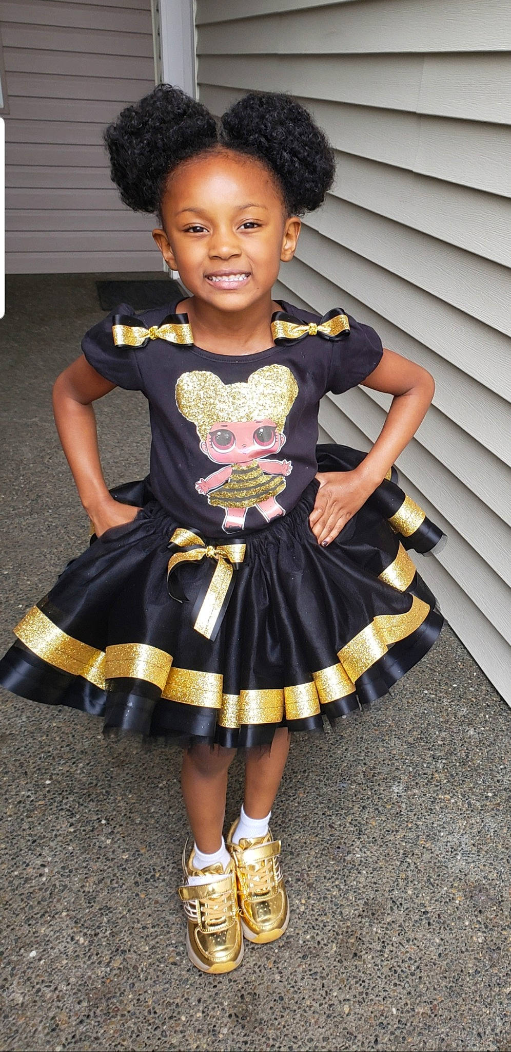 Sa'Niyah is registered to the contest to win money with this photo: child, child_model, clothing, costume, dress, joy, person, smile, toddler, yellow