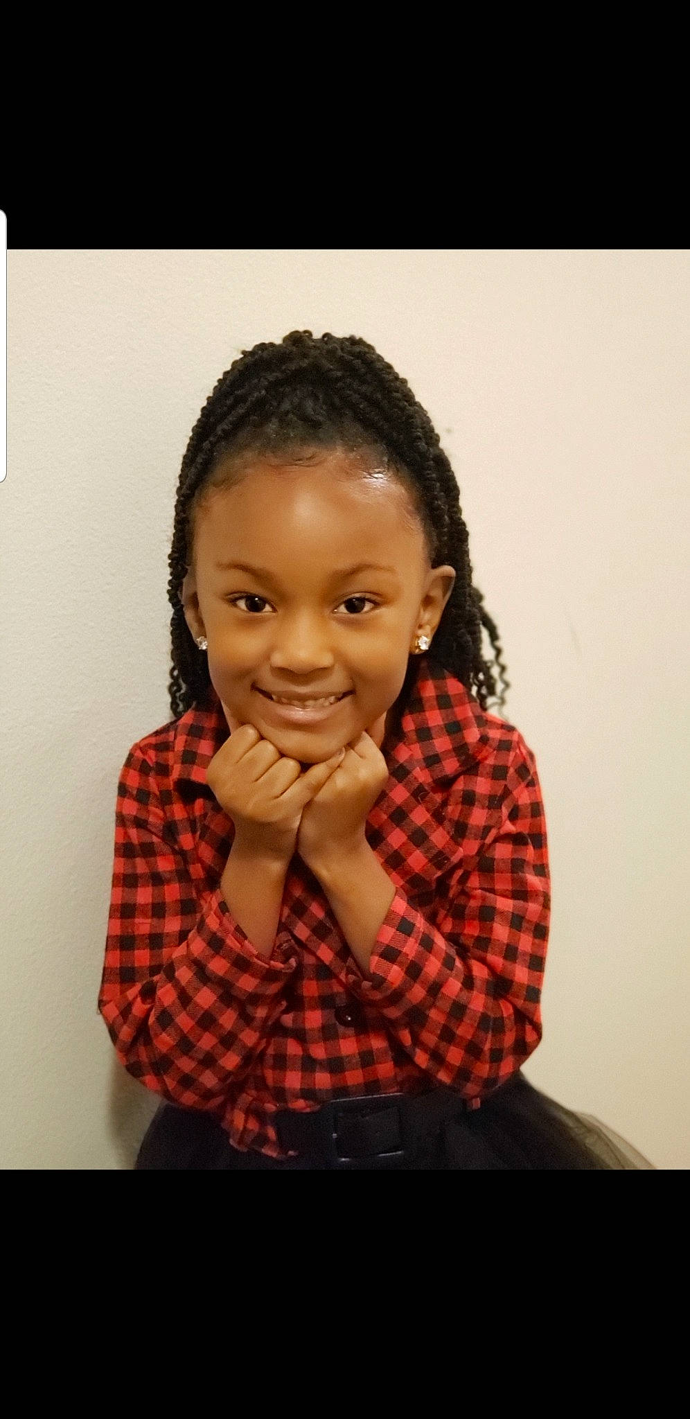 Sa'Niyah joined the competition — help win amazing prizes! black_hair, cheek, child, child_model, cornrows, dreadlocks, face, forehead, hair, hairstyle, head, joy, lip, neck, nose, person, plaid, portrait, sitting, toddler