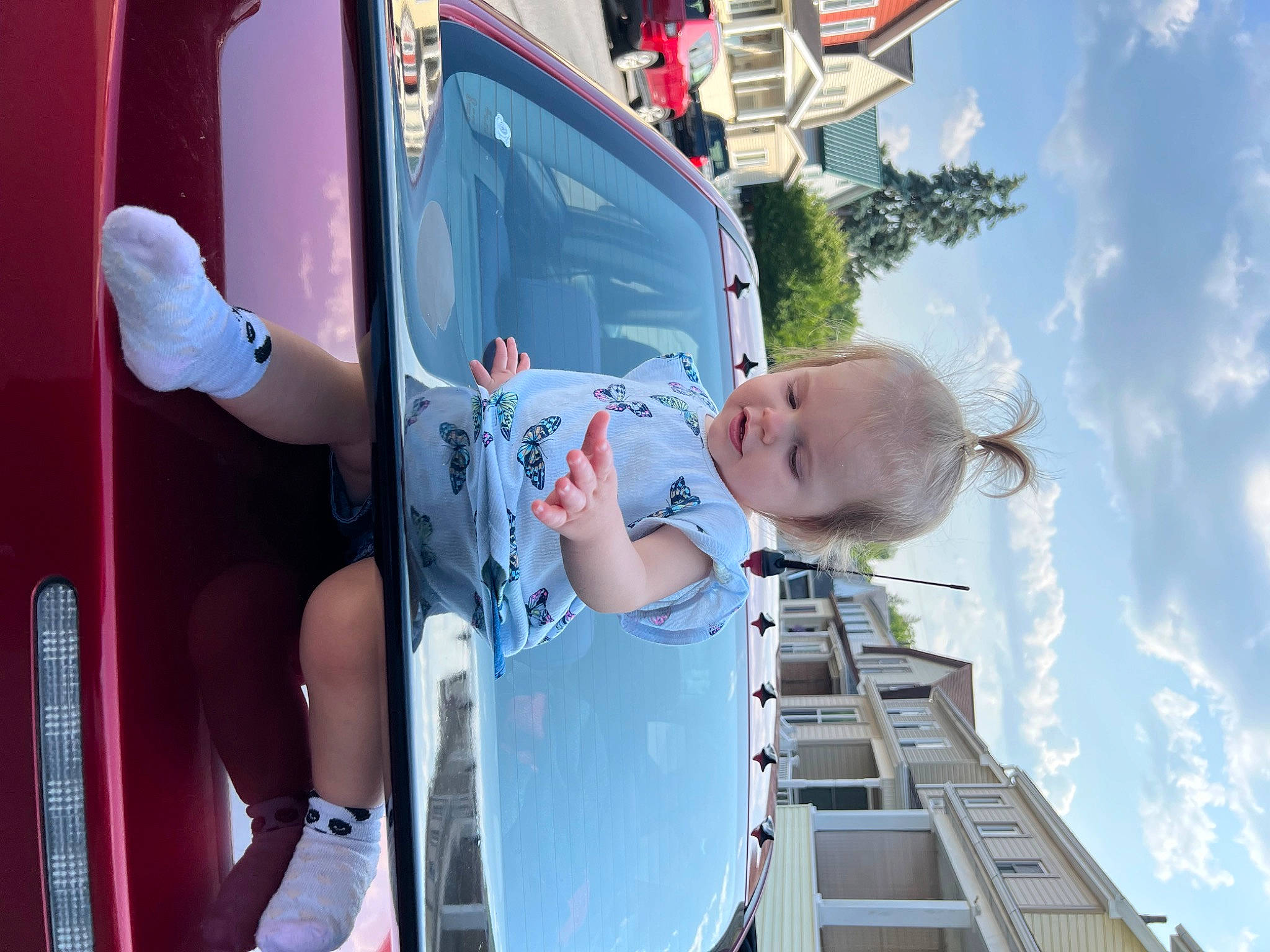 Ember joined the competition — help win amazing prizes! auto_part, automotive_design, automotive_exterior, baby, bumper, car, cloud, electric_blue, fun, leisure, motor_vehicle, person, recreation, sky, smile, t_shirt, toddler, travel, vehicle, vehicle_door