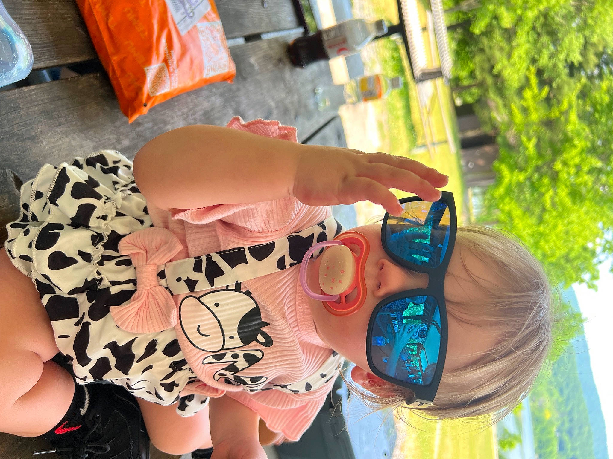 Ember joined the competition — help win amazing prizes! child, elbow, eyewear, fun, happy, hat, headgear, human_leg, leisure, nail, orange, person, sleeve, summer, sunglasses, t_shirt, thigh, toddler, tree, wood