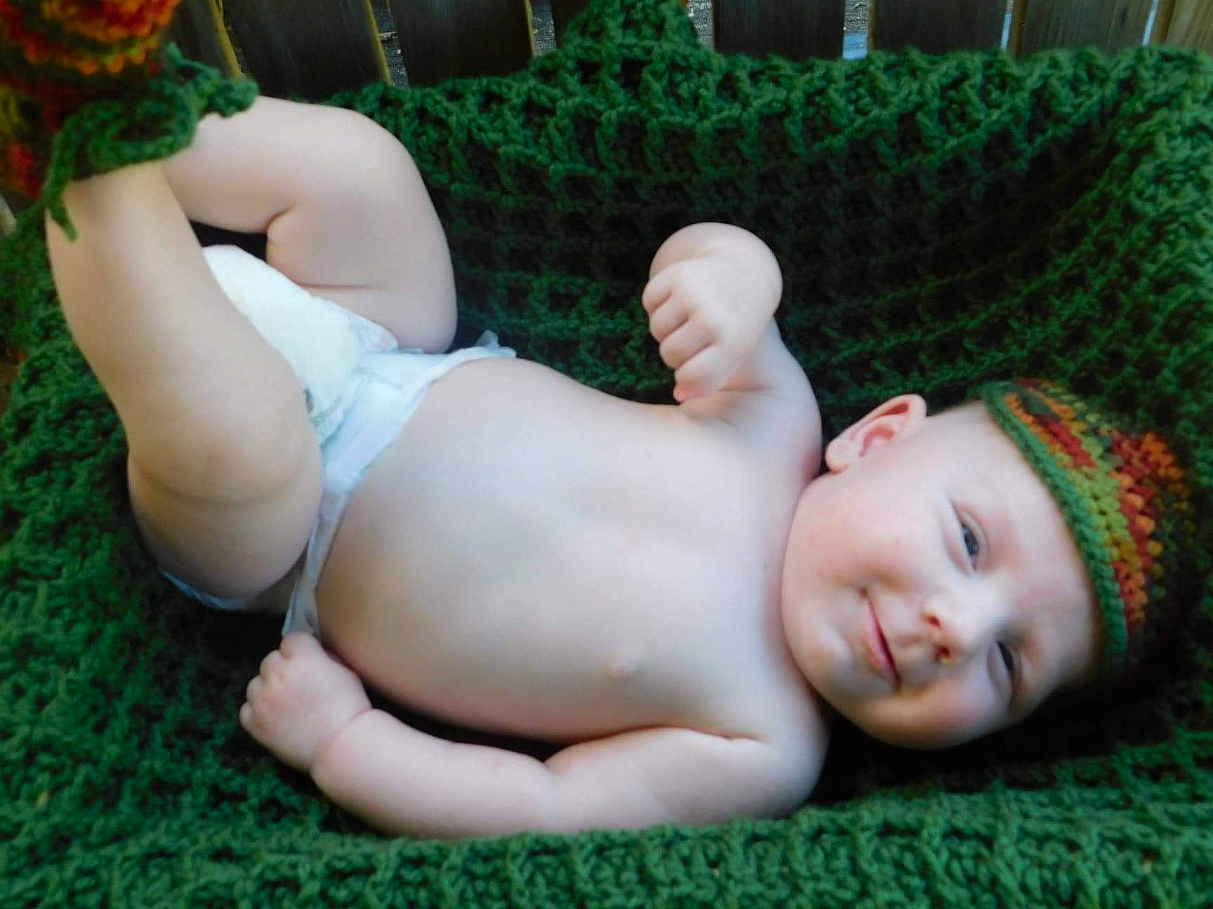 Rowin joined the competition — help win amazing prizes! baby, baby_toddler_clothing, barefoot, beauty, chest, child, finger, grass, green, headwear, leaf, mammal, mouth, muscle, organ, person, skin, textile, thigh, toddler