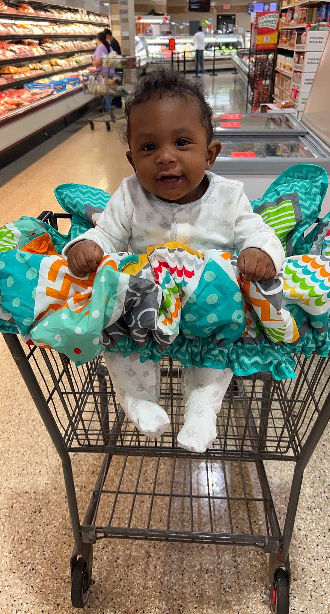 Zamir joined the competition — help win amazing prizes! baby, baby_toddler_clothing, blue, cart, child, dress, eye, face, green, happy, head, person, photograph, product, shelf, shopping_cart, skin, smile, snapshot, toddler