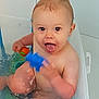Esteban participe au concours pour gagner de l'argent avec cette photo : baby, bathtub, water, toy, splashing, child, bath, happy, smile, skin, indoors, play, cute, infant, fun, small, sitting, wet, expression, bathroom