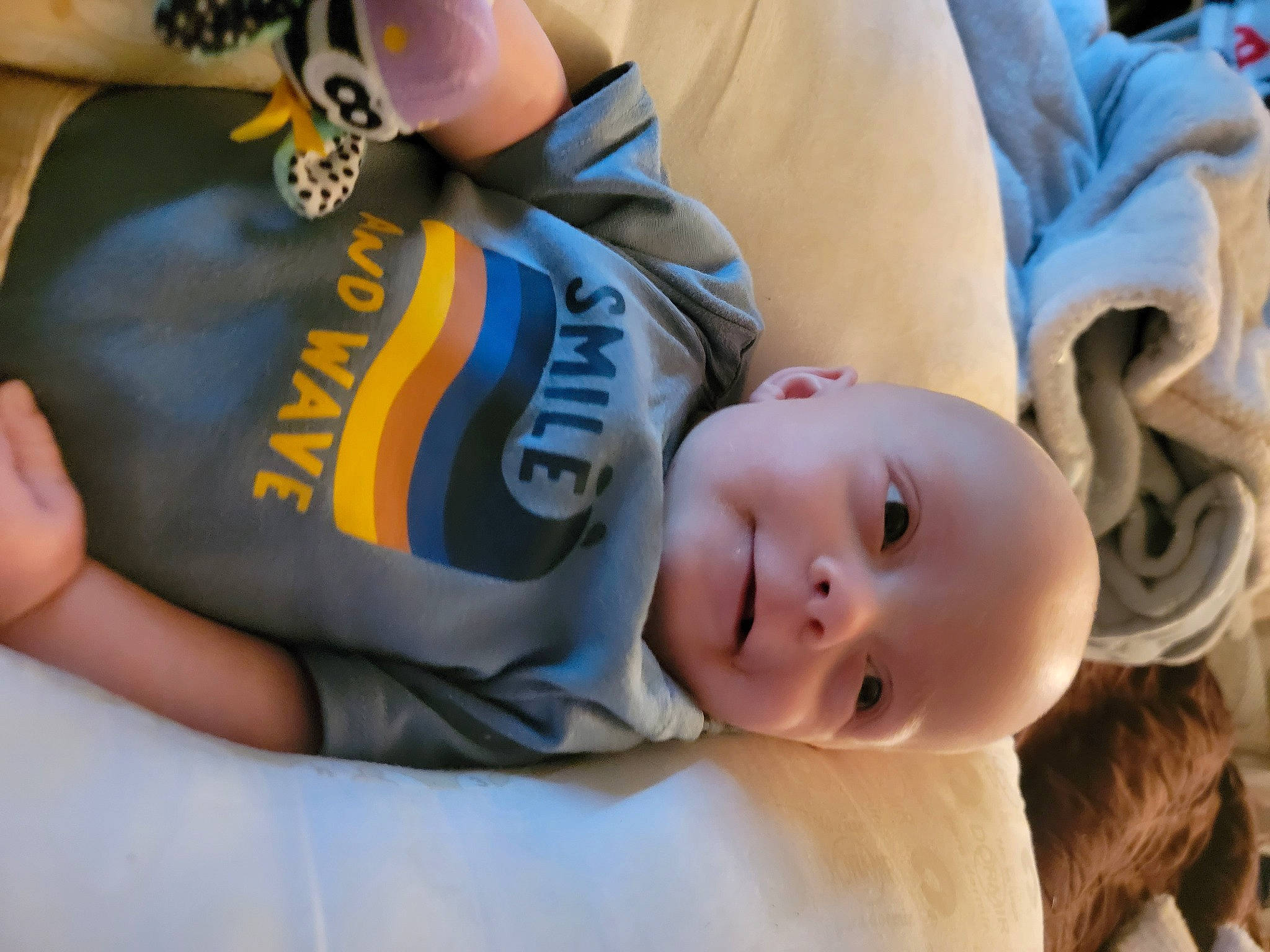 Joseph is registered to the contest to win money with this photo: abdomen, baby, baby_products, baby_toddler_clothing, cheek, child, comfort, elbow, eye, finger, gesture, happy, hat, headgear, human_body, knee, person, sitting, smile, thumb