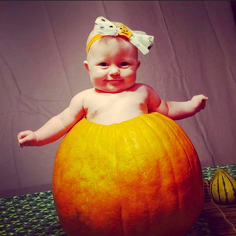 Bryleigh joined the competition — help win amazing prizes! _and_melon_family, _gourd, calabaza, child, costume, cucumber, cucurbita, food, fruit, gourd, orange, person, plant, pumpkin, smile, squash, toddler, vegetable, winter_squash