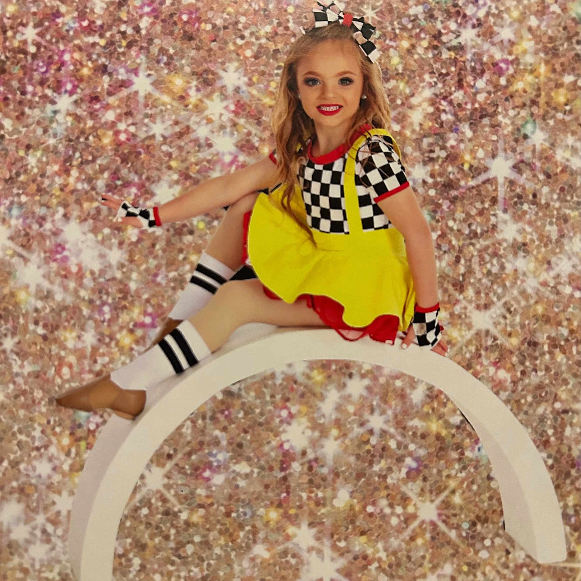 Roselyn joined the competition — help win amazing prizes! actionfigure, beachwear, blonde, chaise, child, clothing, face, female, furniture, girl, hair, head, person, racket, sitting, sleeve, sport, tennis, tennisracket, toy