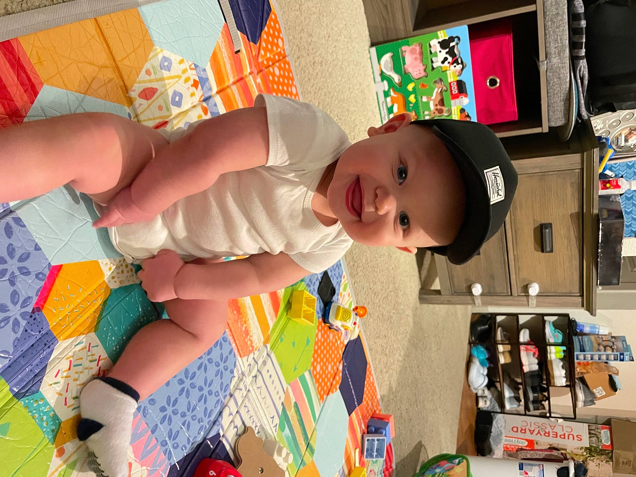 Layton joined the competition — help win amazing prizes! art, baby, baby_products, baby_toddler_clothing, baby_toys, child, fun, happy, head, headwear, linens, pattern, person, play, product, room, shelf, shelving, smile, textile