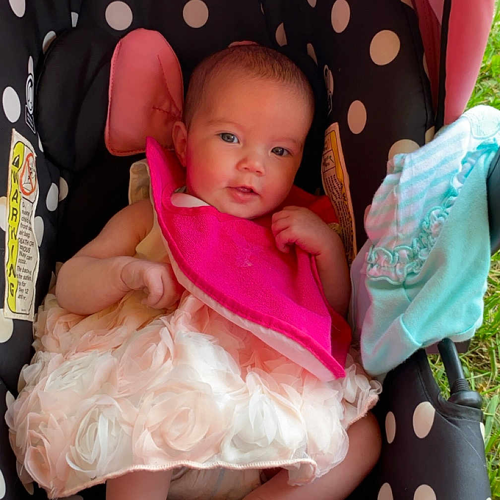 Hopelynn is registered to the contest to win money with this photo: baby, bed, blanket, clothing, crib, cushion, dress, face, furniture, hat, head, homedecor, infantbed, newborn, person, photography, portrait, sleeping, stroller, transportation