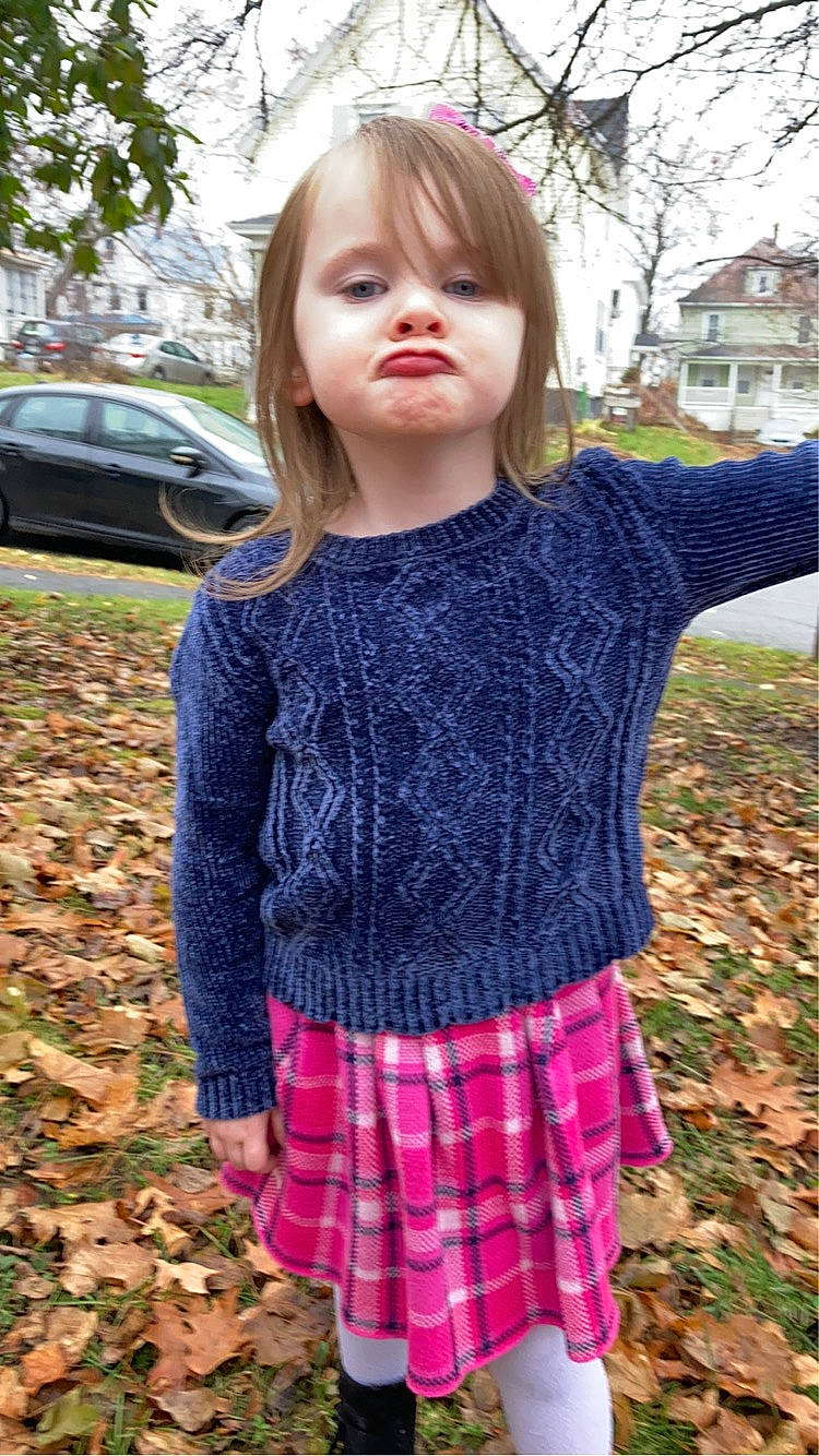 Neveah joined the competition — help win amazing prizes! arm, car, face, grass, hair, hairstyle, head, human_body, iris, lip, person, pink, plaid, plant, sleeve, t_shirt, tartan, tire, tree, waist