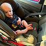 Bradlee is registered to the contest to win money with this photo: baby, car_seat, child, car_interior, seatbelt, safety, infant, portrait, sunlight, window, seat, clothing, head, face, skin, person, transportation, vehicle, cute, young