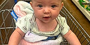 Nyah joined the competition — help win amazing prizes! aisle, baby, blanket, clothing, cute, expression, face, floor, grocery_store, hand, infant, looking_at_camera, paper_towels, product, seated, shelf, shopping, shopping_cart, store, supermarket