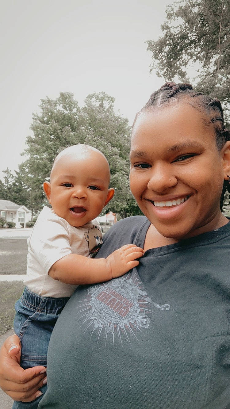 Marvel is registered to the contest to win money with this photo: baby, child, event, face, fun, gesture, grass, happy, head, iris, joy, leisure, lip, people_in_nature, person, plant, recreation, skin, sky, smile