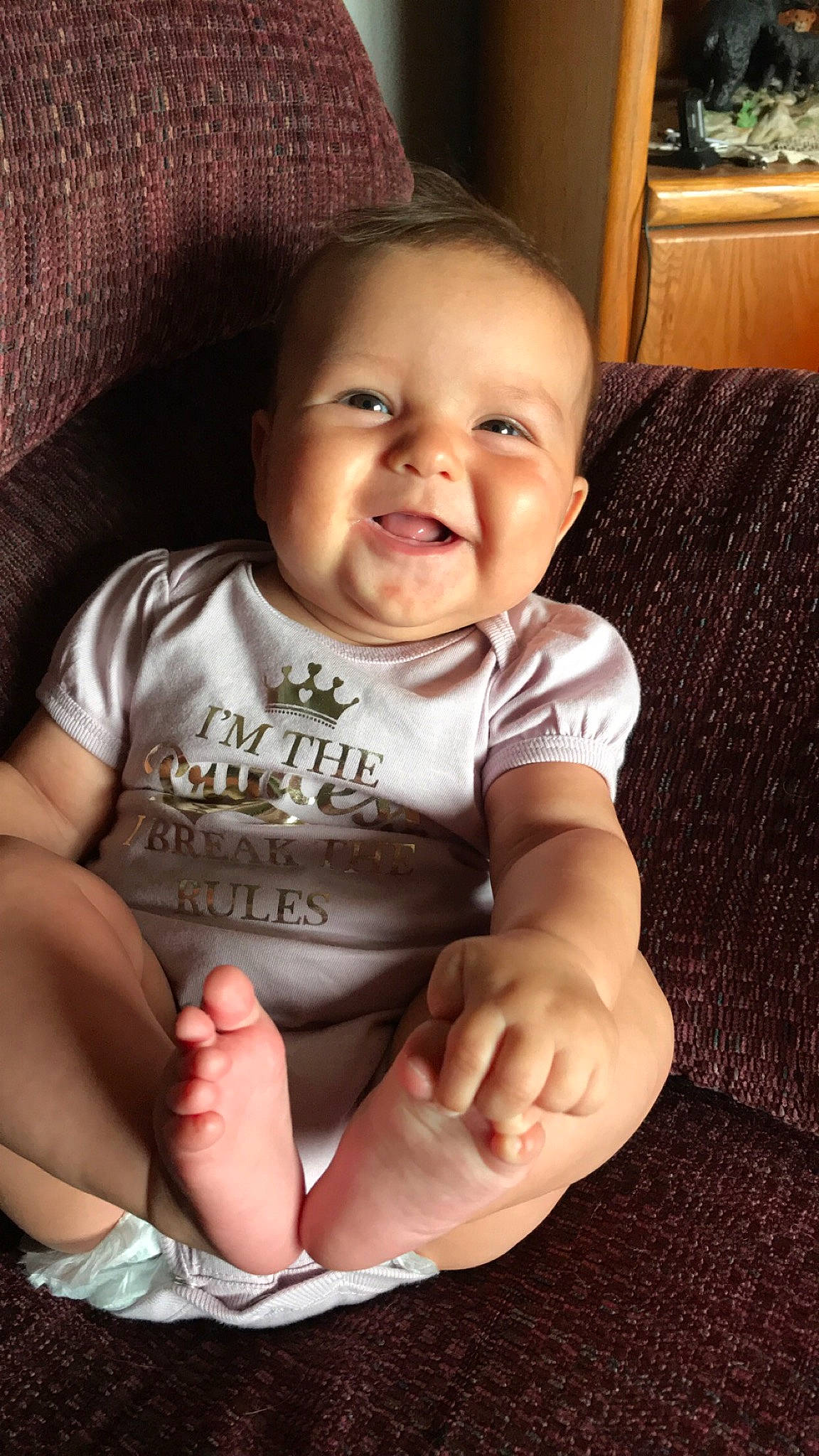 Analiyah joined the competition — help win amazing prizes! arm, baby, baby_toddler_clothing, cheek, child, chin, face, facial_expression, finger, hand, head, laugh, leg, mouth, muscle, nose, person, sitting, skin, smile