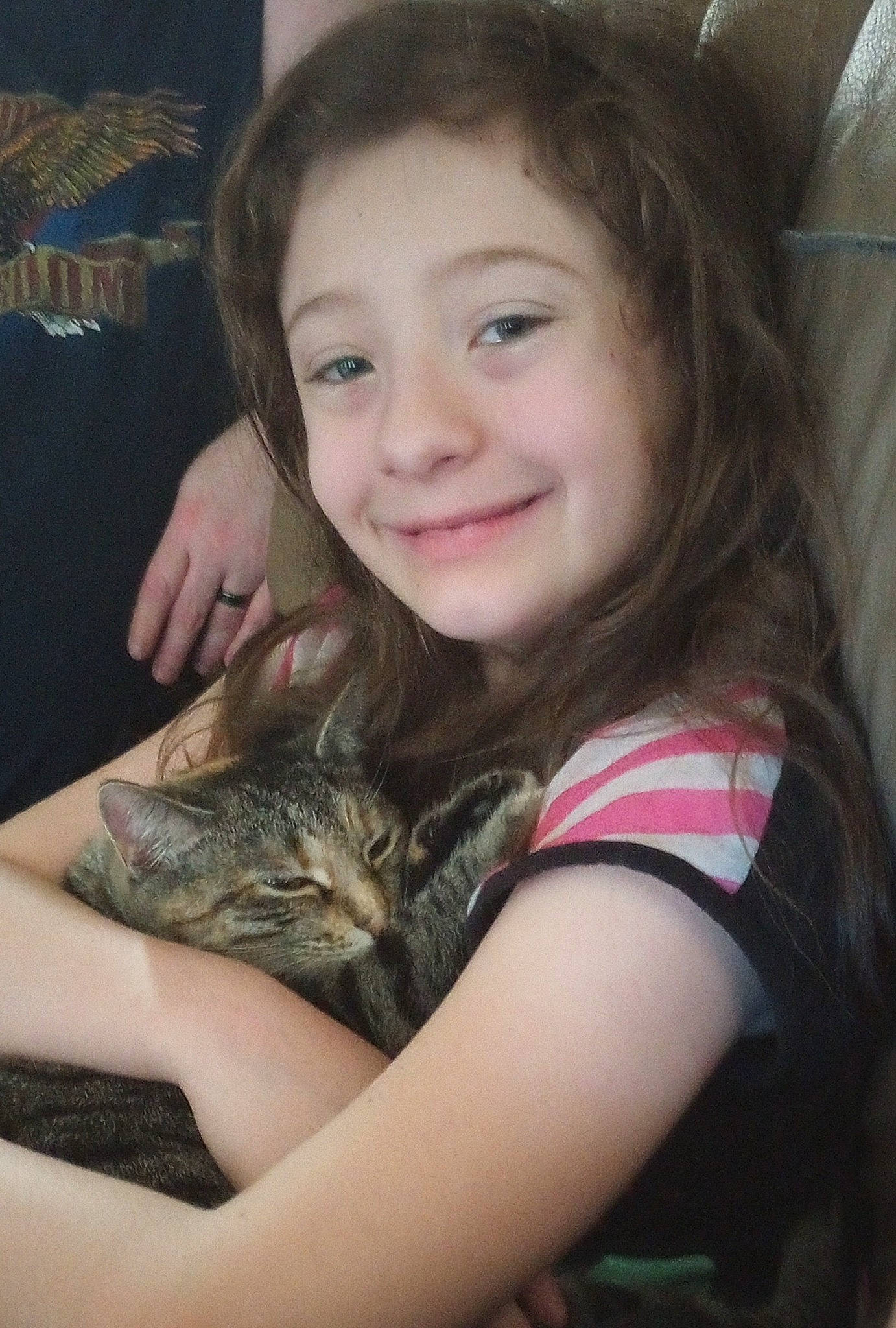 Mikeala joined the competition — help win amazing prizes! black_hair, brown_hair, carnivore, cat, cheek, child, domestic_short_haired_cat, ear, felidae, gesture, happy, iris, joy, long_hair, mammal, neck, person, sitting, skin, small_to_medium_sized_cats