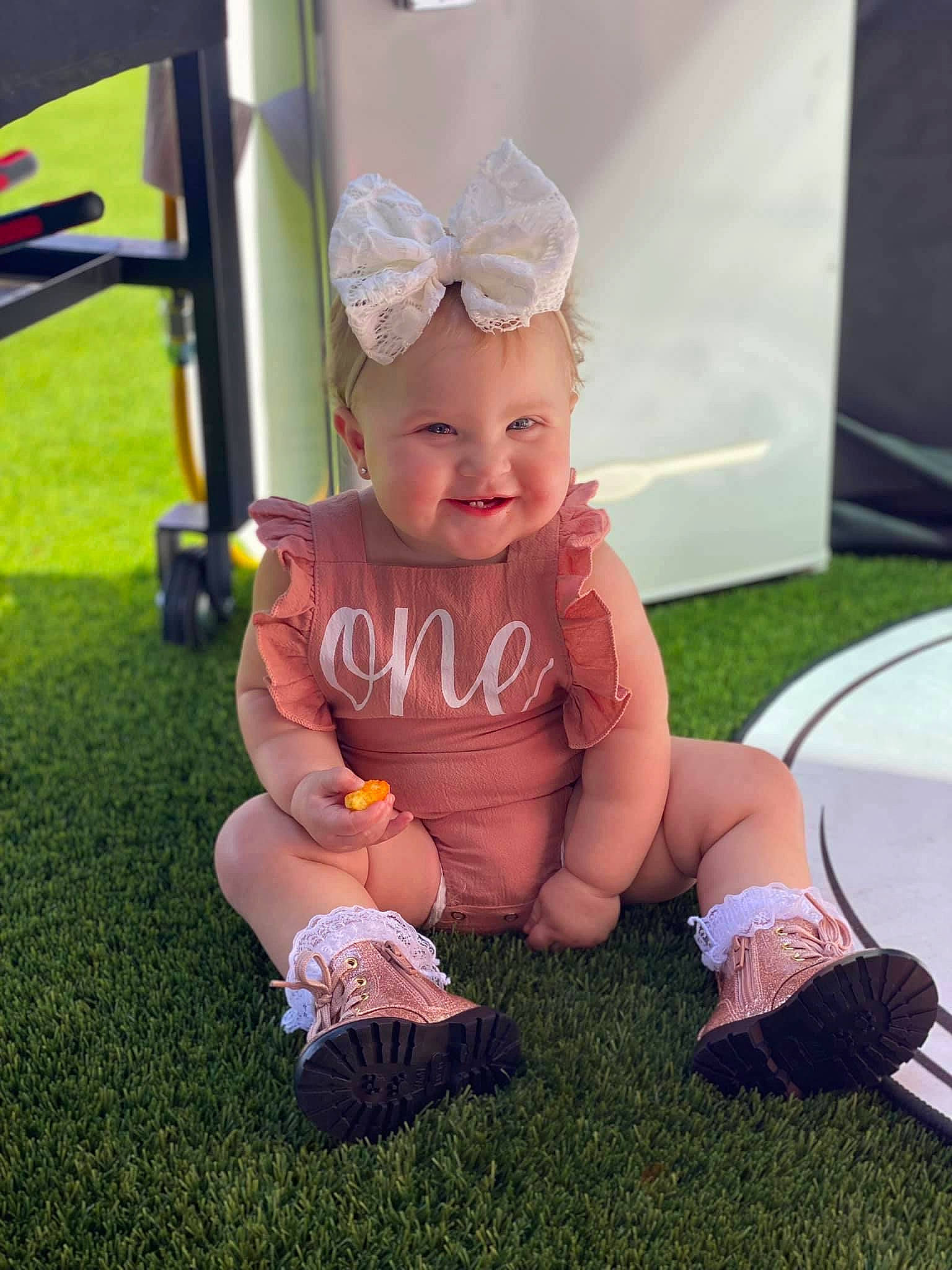 Leila joined the competition — help win amazing prizes! baby, baby_toddler_clothing, birthday, child, fashion_accessory, foot, fun, grass, happy, hat, headband, human_leg, joy, knee, person, pink, recreation, shoe, smile, sneakers
