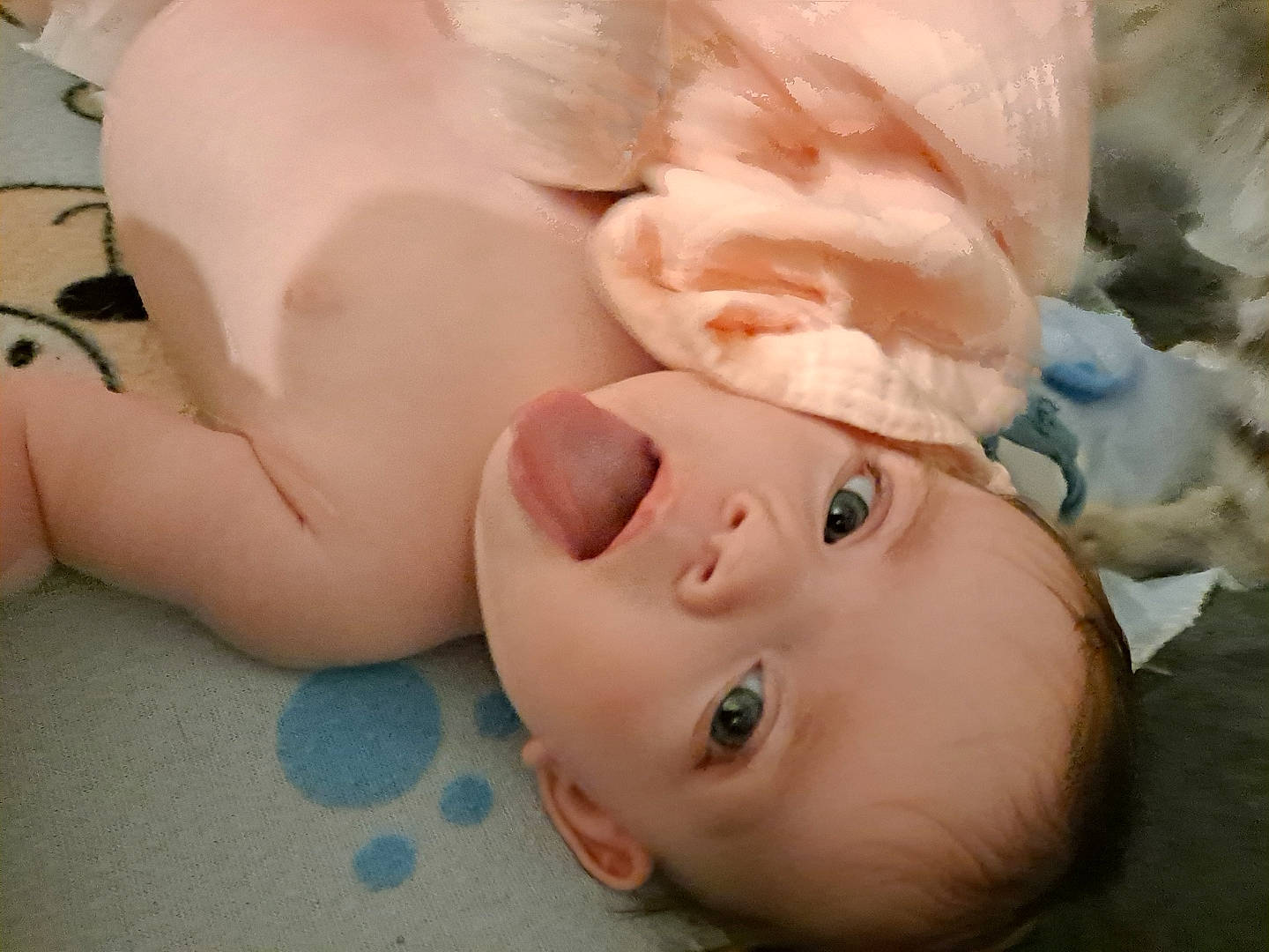 Lily participe au concours pour gagner de l'argent avec cette photo : baby, baby_products, baby_sleeping, baby_toddler_clothing, cheek, child, close_up, comfort, dress, eyelash, face, gesture, grass, happy, hat, linens, lip, nose, person, skin