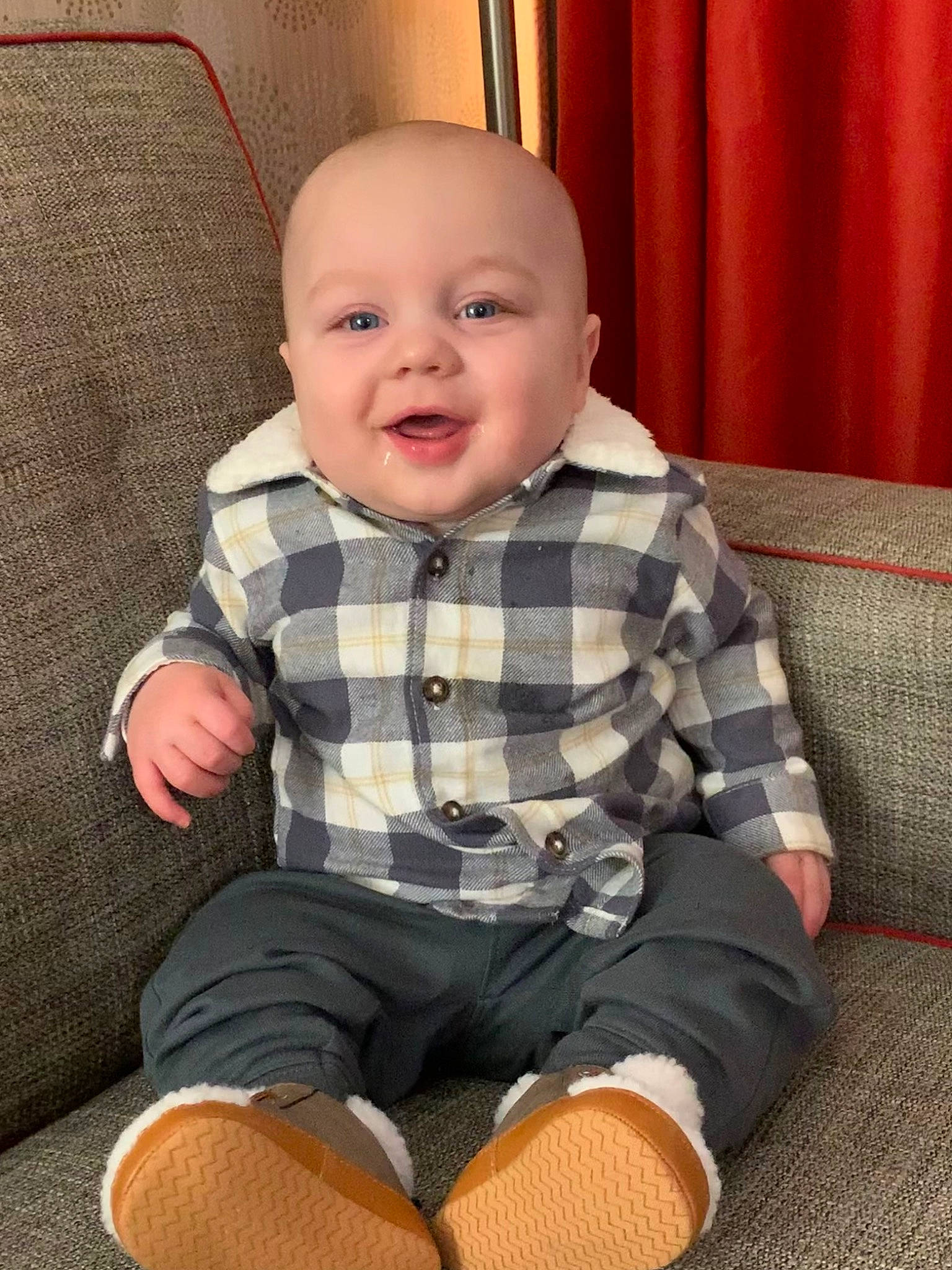Bellamy is registered to the contest to win money with this photo: baby, baby_toddler_clothing, cheek, child, chin, clothing, comfort, eye, face, head, knee, pattern, person, plaid, shorts, skin, sleeve, smile, t_shirt, thigh