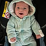Maël participe au concours pour gagner de l'argent avec cette photo : baby, baby_clothes, car_seat, child, clothing, cozy, cute, face, happy, hood, indoor, infant, mint_green, onesie, portrait, seatbelt, small_hands, smiling, wearing_hood, young_child