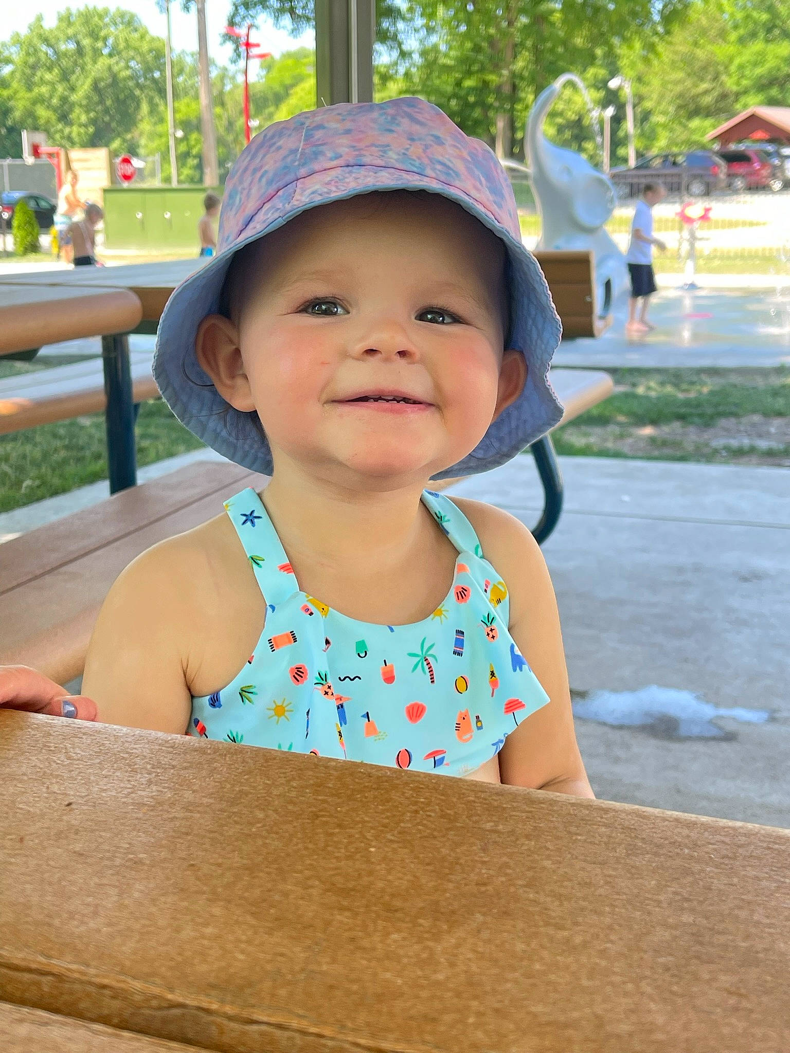 Maylie is registered to the contest to win money with this photo: baby, baby_toddler_clothing, child, fun, grass, happy, hat, headwear, joy, leisure, person, pink, plant, playground, recreation, skin, smile, summer, sun_hat, toddler