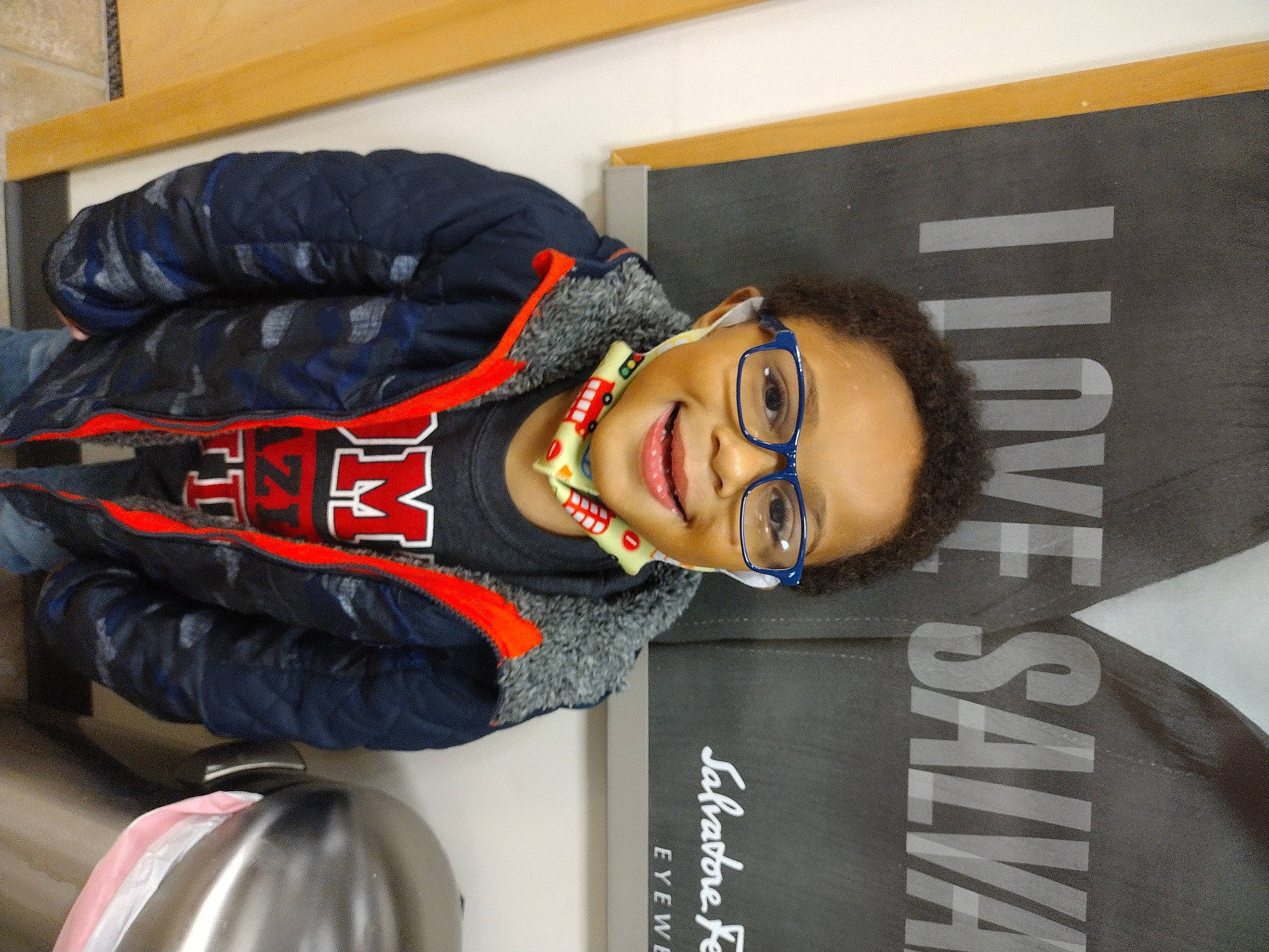 Major is registered to the contest to win money with this photo: advertising, art, automotive_design, automotive_tire, automotive_wheel_system, cool, eyewear, font, joy, person, personal_protective_equipment, rim, room, sculpture, sleeve, smile, sportswear, statue, street_fashion, tire