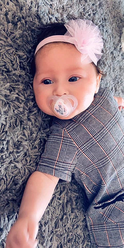 Layla-mae joined the competition — help win amazing prizes! baby, cheek, child, child_model, face, head, headgear, headwear, lip, nose, pattern, person, photography, pink, skin, smile, toddler