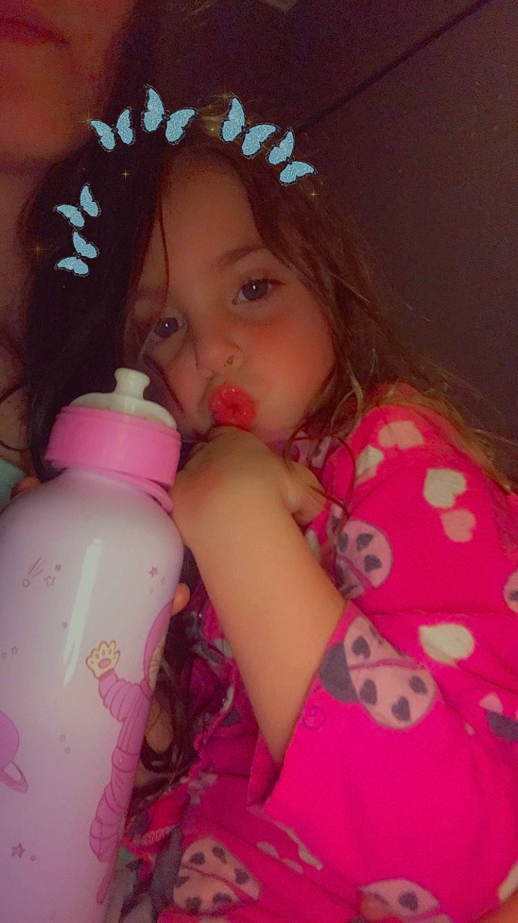 Aurora joined the competition — help win amazing prizes! baby_bottle, baby_toddler_clothing, bottle, child, drink, drinking, drinkware, eyelash, facial_expression, finger, hand, happy, nail, neck, person, pink, plastic_bottle, product, skin, toddler