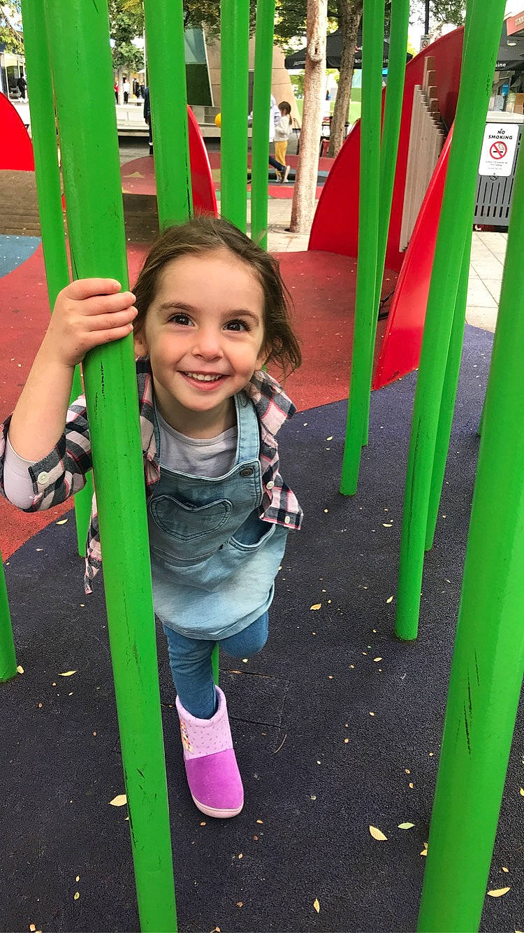 Aurora joined the competition — help win amazing prizes! child, chute, city, fun, grass, green, happy, human_settlement, joy, leisure, magenta, outdoor_play_equipment, person, play, playground, product, public_space, recreation, smile, snapshot