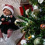 baby, christmas, holiday, tree, ornaments, presents, blanket, festive, hat, striped, red, white, green, smile, cute, infant, clothing, celebration, decorations, toddler