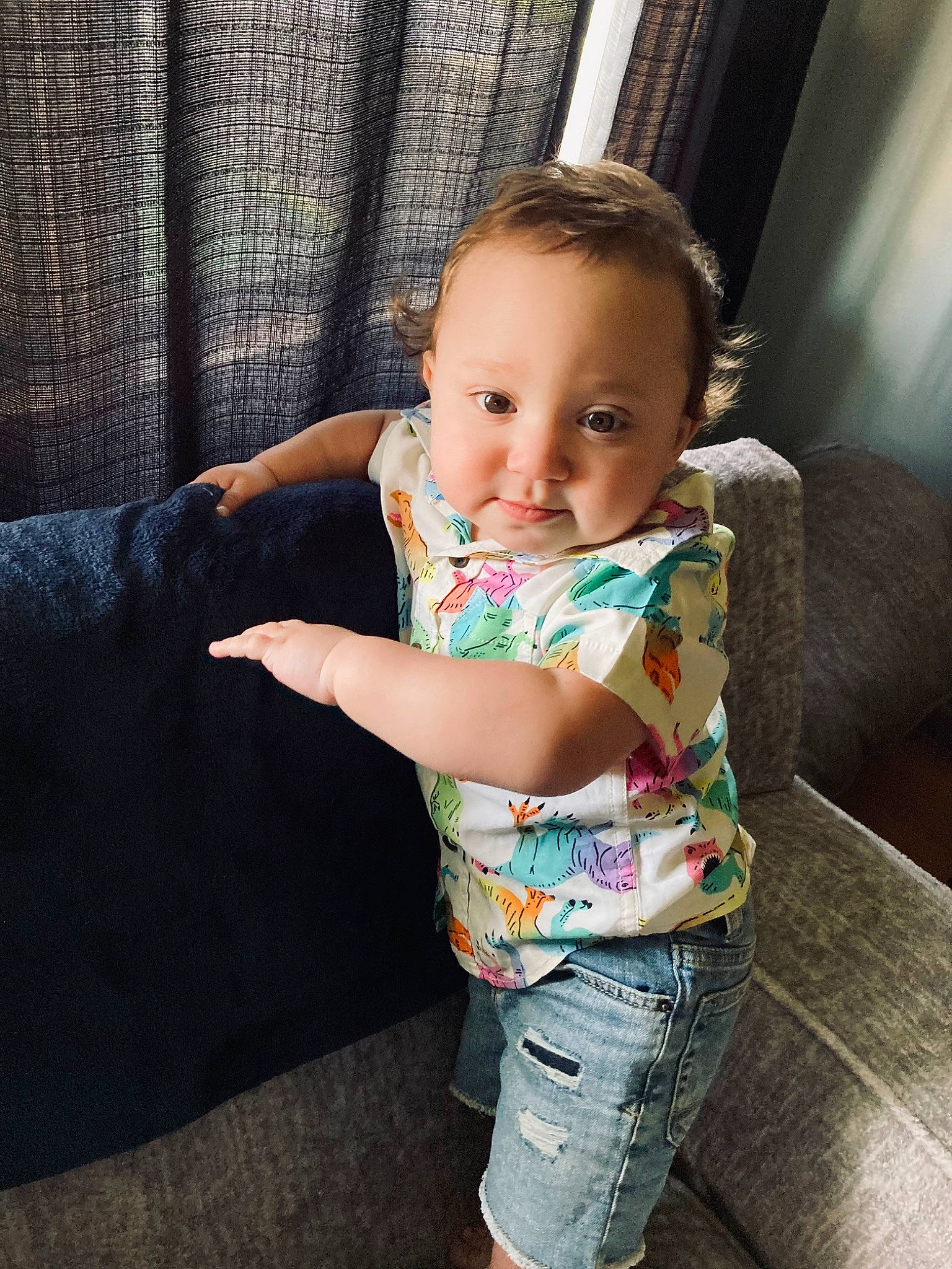 Kannon is registered to the contest to win money with this photo: baby, baby_toddler_clothing, cheek, comfort, couch, elbow, facial_expression, flooring, hair, happy, head, leg, person, shorts, shoulder, skin, sleeve, t_shirt, thigh, toddler