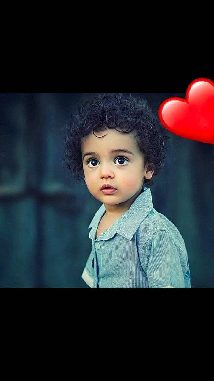 Rayan participe au concours pour gagner de l'argent avec cette photo : balloon, black_hair, cheek, child, child_model, cool, eye, face, flash_photography, fun, happy, head, human, love, person, photography, portrait_photography, sky, smile, toddler