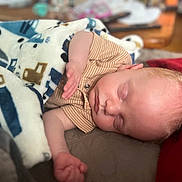 Waylon is registered to the contest to win money with this photo: arm, baby, blanket, child, clothing, comfort, cozy, cute, face, hand, head, indoor, infant, nap, peaceful, portrait, resting, skin, sleeping, soft_lighting