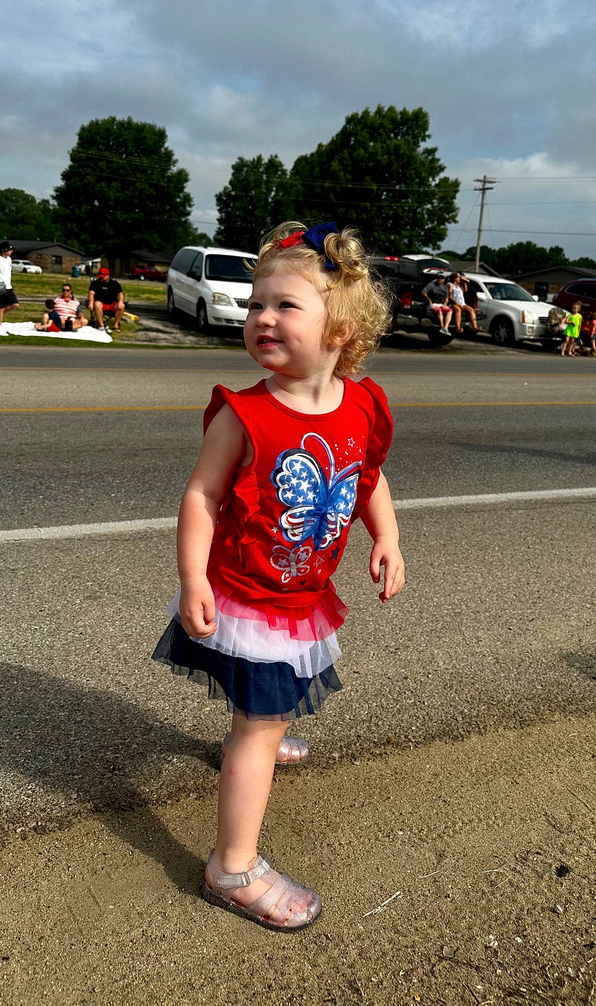 Emberlynn joined the competition — help win amazing prizes! asphalt, car, child, cloud, electric_blue, event, fun, happy, joy, leisure, motor_vehicle, person, recreation, road, sandal, sky, summer, tire, toddler, tree