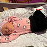Ysabella is registered to the contest to win money with this photo: baby, baby_girl, blanket, bow, child, clothing, crib, cute, headband, hello_kitty, indoors, infant, mittens, newborn, peaceful, pink_clothing, portrait, resting, sleeping, soft