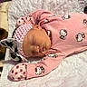 apparel, baby, blanket, bow, child, cute, fur, headband, hello_kitty, indoors, infant, newborn, peaceful, pink_clothing, portrait, quilted, resting, sleep, sleeping, soft_texture