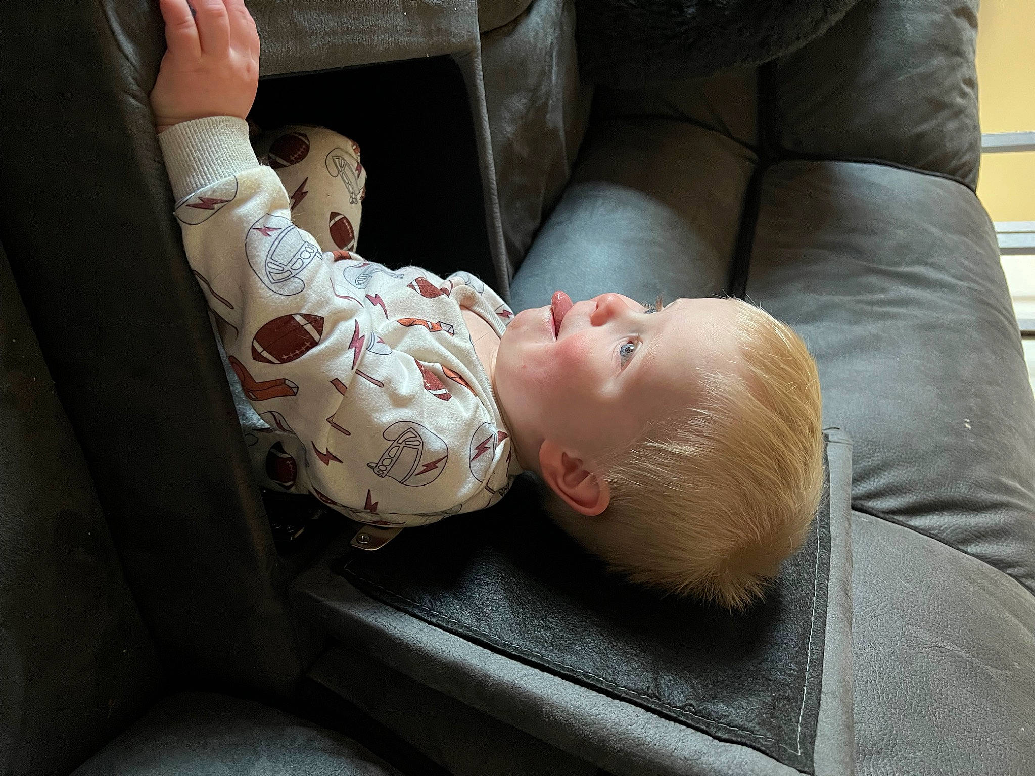 Wyatt is registered to the contest to win money with this photo: baby, baby_products, baby_toddler_clothing, chair, cheek, child, comfort, couch, eye, flooring, foot, human_leg, knee, nap, person, room, sitting, sleep, toddler, wood