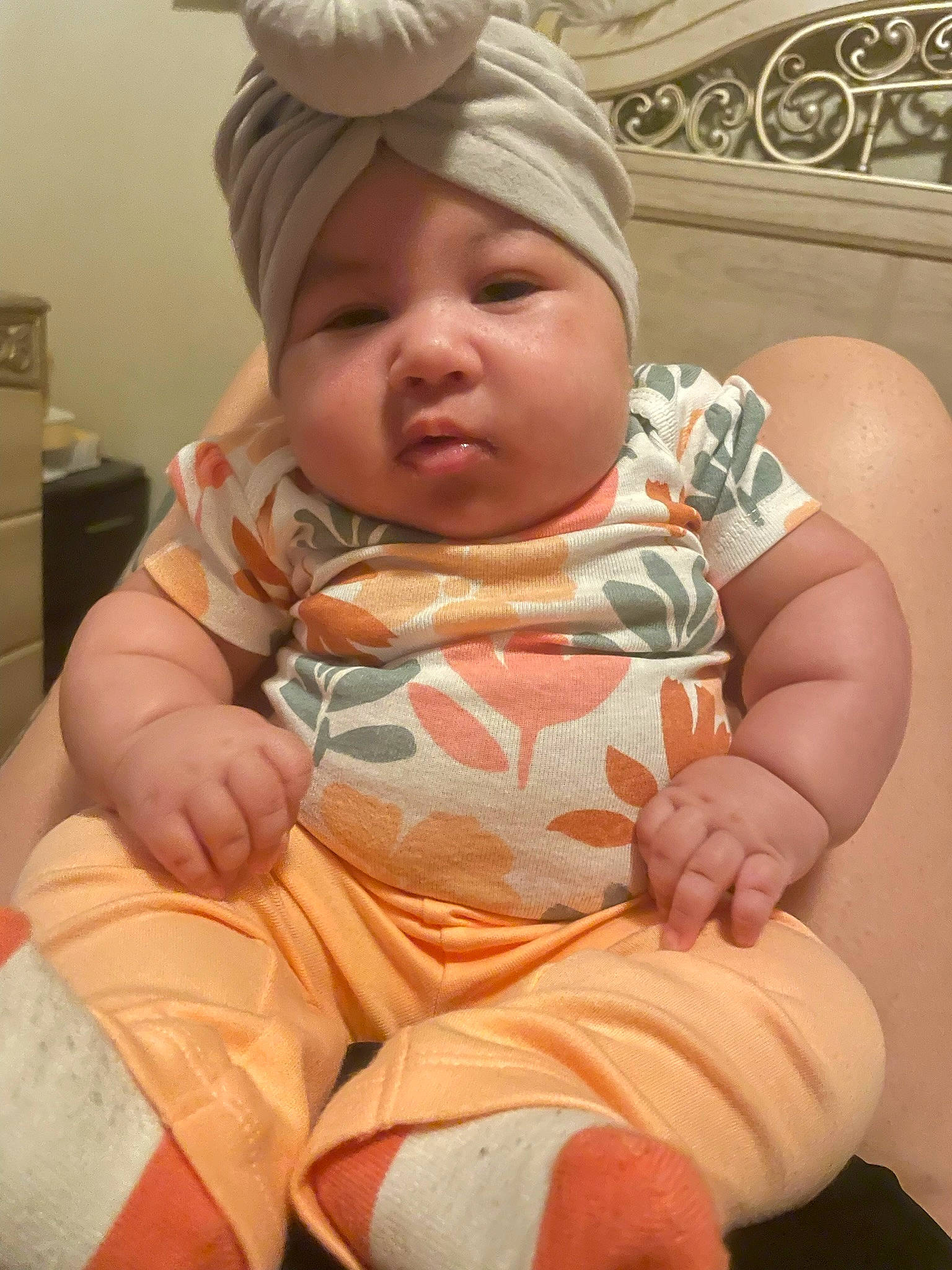 Nelanii is registered to the contest to win money with this photo: baby, baby_sleeping, baby_toddler_clothing, cabinetry, cheek, child, comfort, face, finger, headwear, kitchen_appliance, knee, linens, mouth, person, pink, sitting, skin, sleeve, thigh