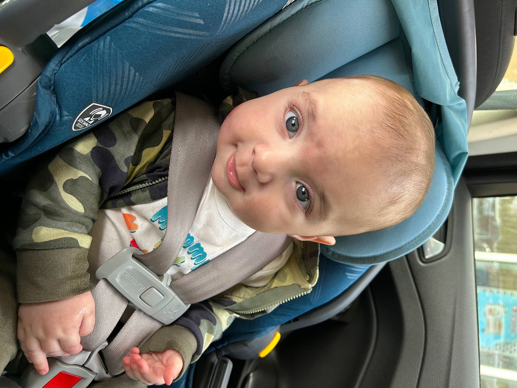 Malachi is registered to the contest to win money with this photo: auto_part, baby, baby_carriage, baby_products, car, car_seat, car_seat_cover, child, comfort, electric_blue, eye, family_car, head_restraint, motor_vehicle, person, product, seat_belt, smile, toddler, tree
