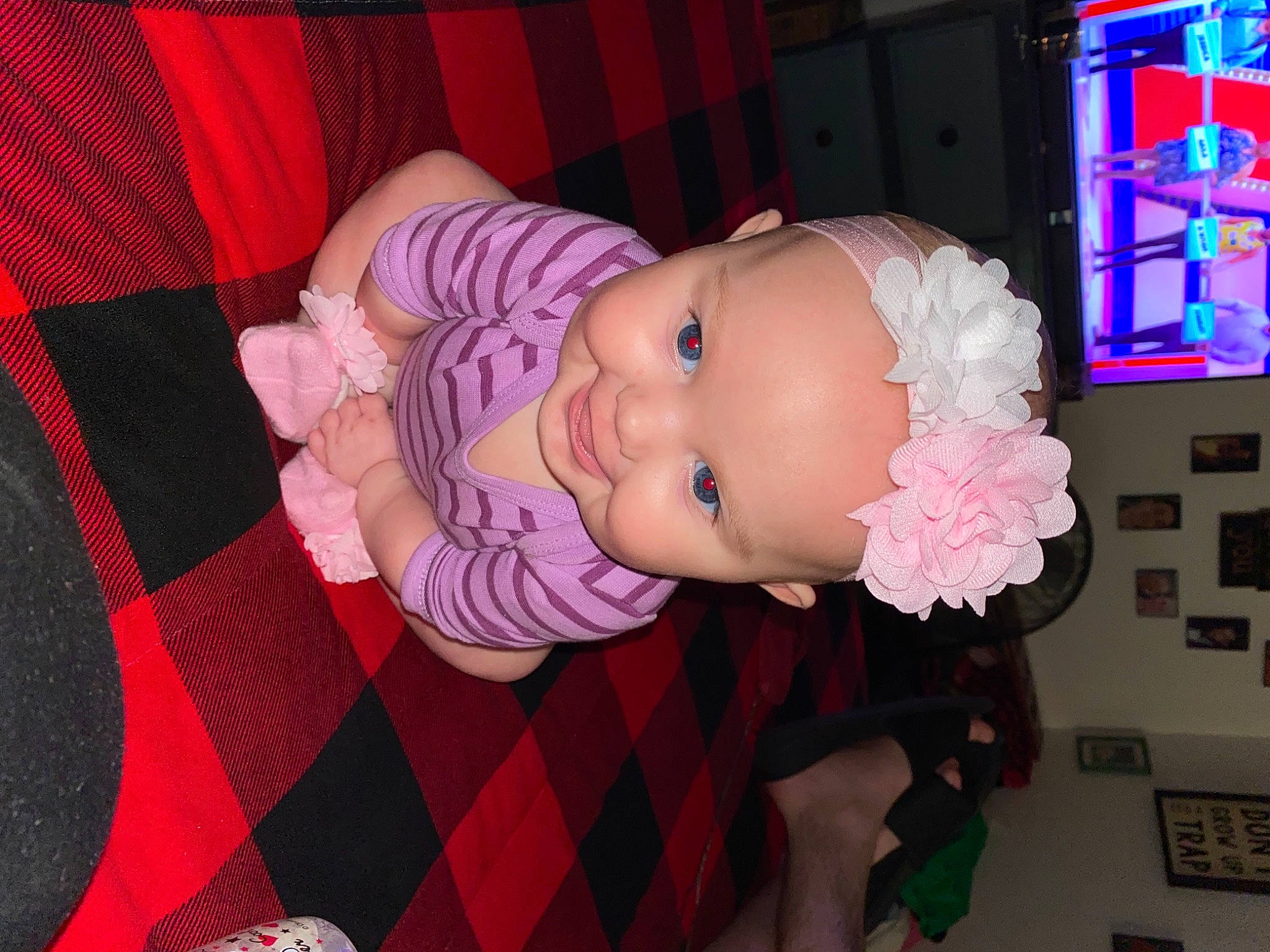 Camila joined the competition — help win amazing prizes! baby, baby_products, baby_toddler_clothing, cheek, child, fun, headwear, magenta, party, pattern, person, pink, plaid, purple, red, room, skin, smile, sweetness, tartan