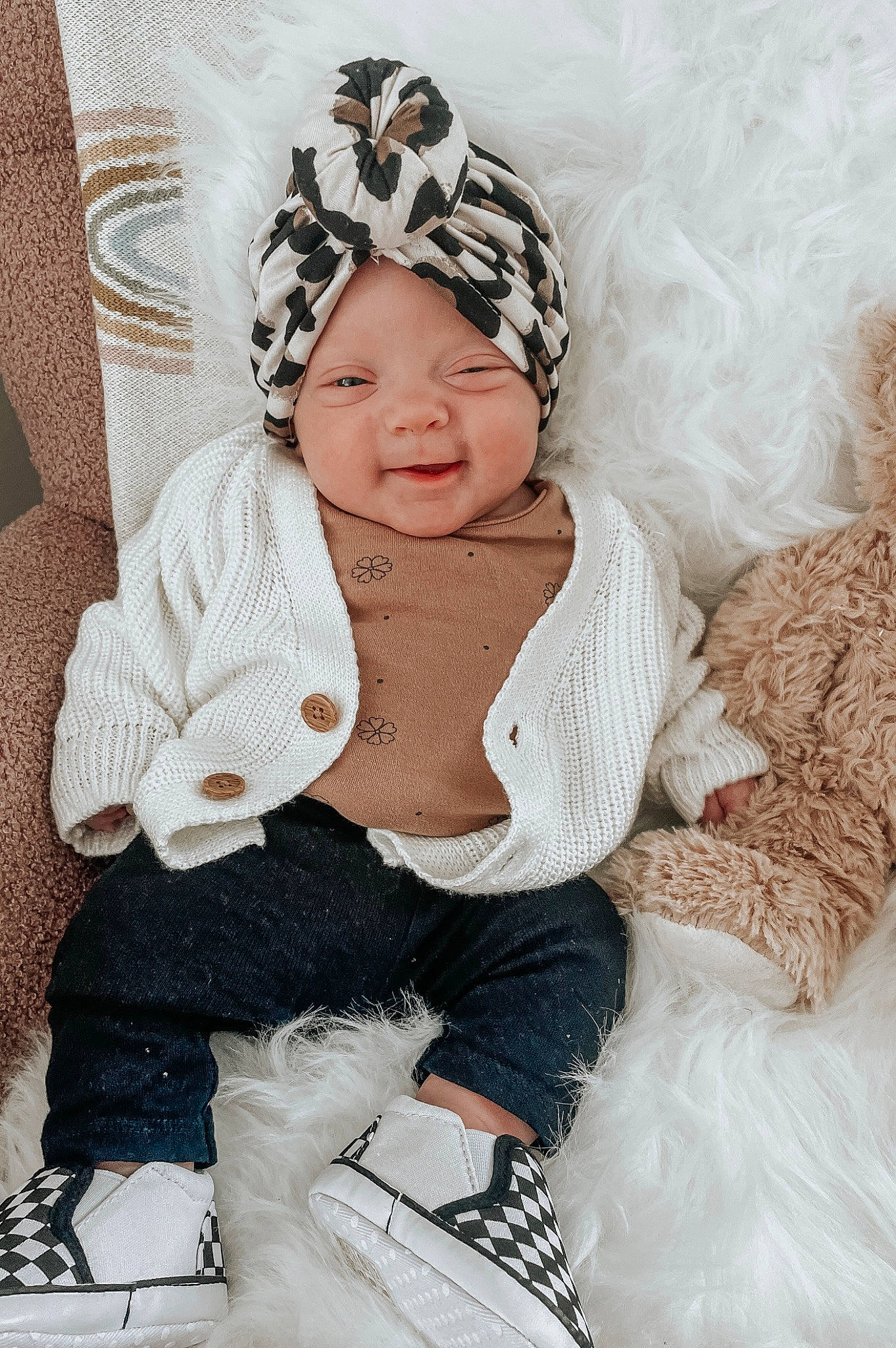 Novalee is registered to the contest to win money with this photo: baby, baby_toddler_clothing, cap, child, clothing, comfort, embellishment, eye, flash_photography, fur, happy, headpiece, headwear, knit_cap, pattern, person, sitting, sleeve, smile, toddler