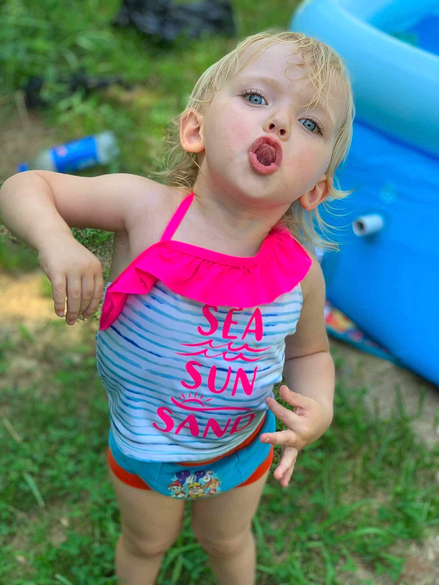 Alaina is registered to the contest to win money with this photo: child, fun, grass, happy, leisure, person, plant, play, recreation, smile, summer, toddler, vacation